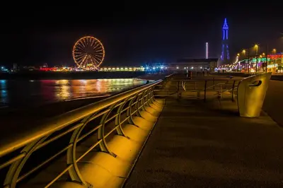 a night view of a pier with a ferris wheel at Forshaws Hotel - Blackpool in Blackpool