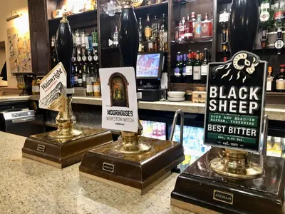 two trophies on the counter of a bar at Calf's Head Hotel in Clitheroe