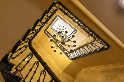 a mirror hanging from a ceiling in a room at The Sir Thomas Hotel in Liverpool