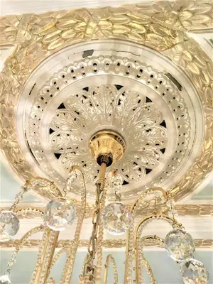 a chandelier is hanging from a ceiling at Astley Bank Hotel in Darwen