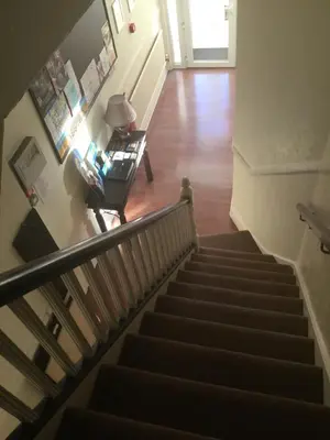 an overhead view of a staircase in a house with a desk at The Windsor Carlton in Blackpool