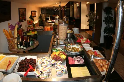a buffet line with many different types of food at Inn On The Prom At The Fernlea Hotel in Lytham St Annes