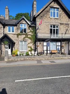 a building on the side of a street at Elton Guest House in Grange Over Sands
