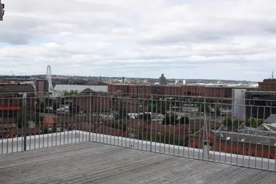 a view of a city from the roof of a building at The Print Works Apartments in Liverpool