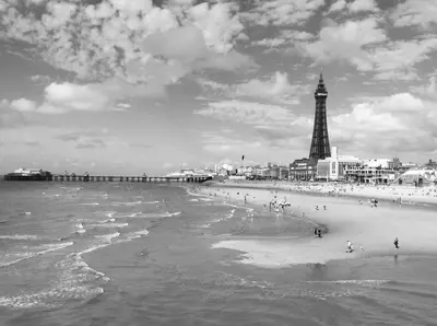 a black and white photo of a beach with the eiffel tower at The Galloway in Blackpool