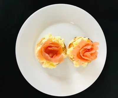 a white plate with two pastries on top at Windsor Park Hotel in Blackpool
