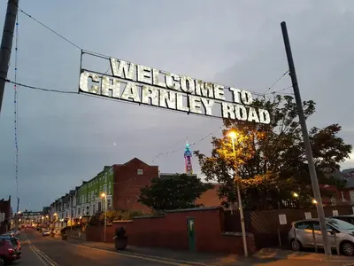 a sign that reads welcome to strawberry road on a street at The Osprey Hotel in Blackpool