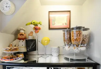 a shelf with food and other items on it at Clifton Villa - Southport in Southport