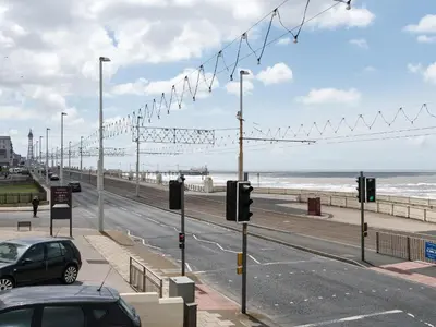 a street with street lights on the beach at Ocean View House in Blackpool