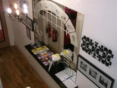 a room with a wall with a gas station at Holmeleigh Hotel in Blackpool