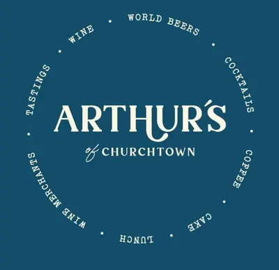 a circle with the words artventures and chirium at Arthur's Bar & Accommodation in Southport