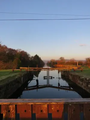 a view of a canal with ducks in the water at The Bay Horse Hotel And Restaurant in Ulverston