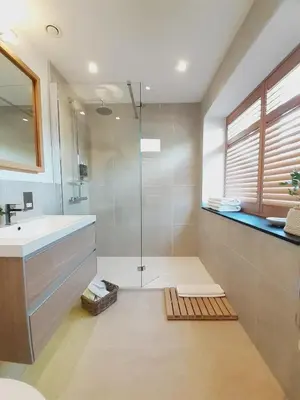a bathroom with a shower and a sink at Lancaster Barn in Lancaster