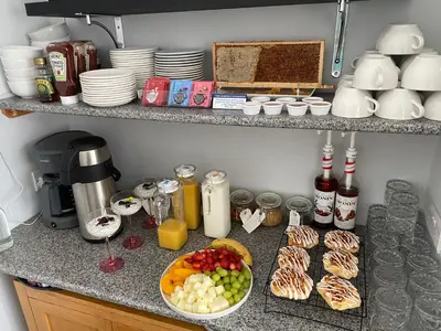 a kitchen counter with a bunch of food on it at Sunnyside Guest House Southport - winner of Best B&B in the country 2025-26 in Southport