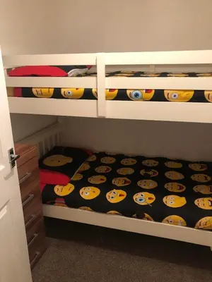 a childs bunk bed with hello kitty heads on the bottom at Baxter Holiday Apartments in Blackpool
