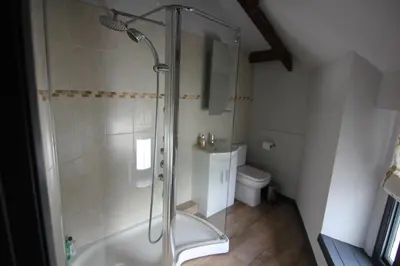 a bathroom with a shower and a toilet at The Warehouse in Ulverston