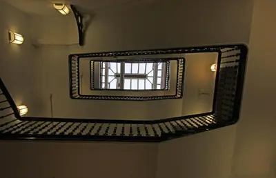 a mirror on a wall in a bathroom at The Castle Collection 14 Cook Street in Liverpool