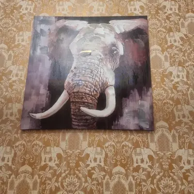 a painting of an elephant hanging on a wall at Tracey's Driftwood in Blackpool