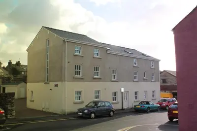 a large building on the side of a street at 3 Laurel Court in Ulverston