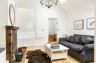 a living room with a couch and a table at Castle View in Lancaster