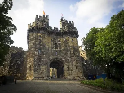 an old stone building with an arch way at Castle View in Lancaster