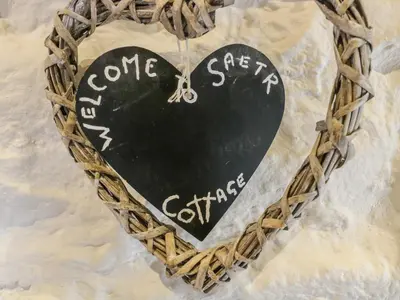 a heart shaped sign with the words someone special written on it at Saetr Cottage in Harrop Fold