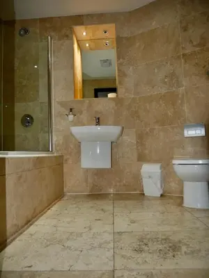 a bathroom with a sink and a toilet at Print Works Hotel in Liverpool