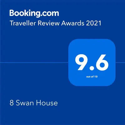 a screenshot of a phone with a swan house at 8 Swan House in Carnforth