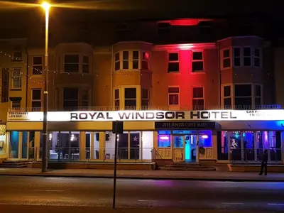 a building on a street at night at The Royal Windsor Hotel in Blackpool