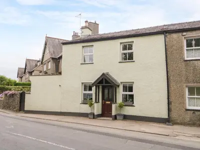 a house on the side of a street at Mulberry Cottage in Grange Over Sands