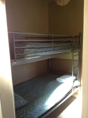 a room with two bunk beds in a room at Victoria Hotel Blackpool in Blackpool