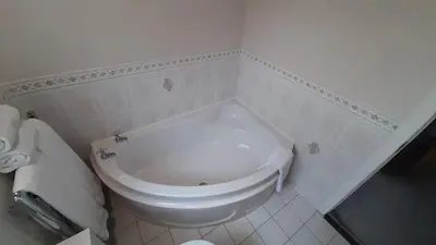 a bathroom with a white toilet in a room at The Blackpool Apartment in Blackpool