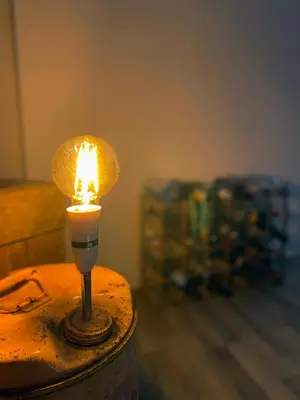 a candle on top of a table in a room at The Docklands SA by Serviced Living Liverpool in Liverpool