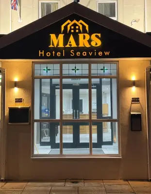 a hotel sign on the front of a building at MARS Hotel Seaview Blackpool in Blackpool
