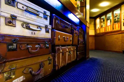 a stack of suitcases stacked on top of each other at The Liner at Liverpool in Liverpool