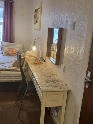 a room with a desk and a bed and a desk at 140 Bond - Holiday Home in Blackpool