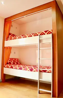 a bunk bed room with two bunk beds at The Liverpool Pod Travel Hostel in Liverpool