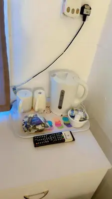 a counter with a keyboard and other items on it at Fern Villa Hotel - Albert Road in Blackpool
