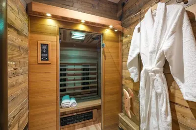 a bathroom with a shower and a mirror at Lymestone Boutique Accommodation in Grange Over Sands