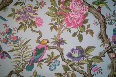 a floral wallpaper with a bird and flowers at Lymestone Boutique Accommodation in Grange Over Sands