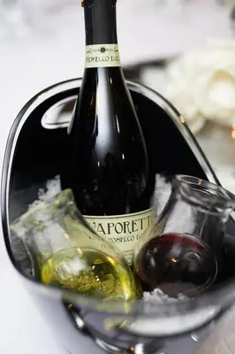 a bottle of wine and a glass in a bucket at Hard Days Night Hotel Liverpool in Liverpool