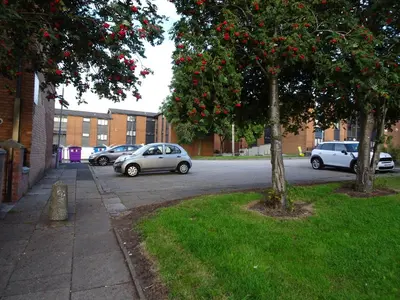 a group of cars parked in a parking lot at Home with a view in Liverpool