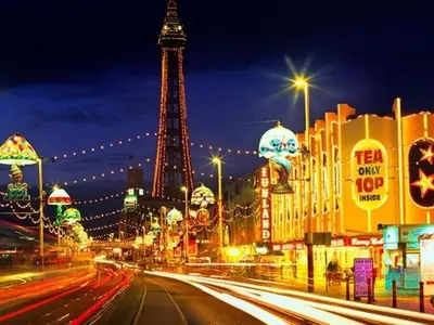 a city street at night with the eiffel tower at The New Osterley Hotel in Blackpool