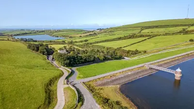 an aerial view of a bridge over a body of water at Elm Lodge in Ulverston