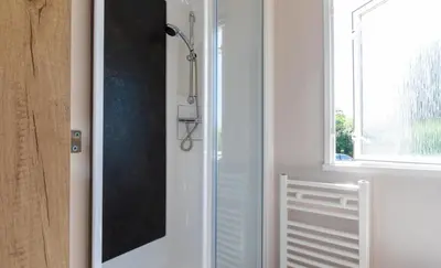 a bathroom with a shower and a window at Mowbreck Park in Kirkham