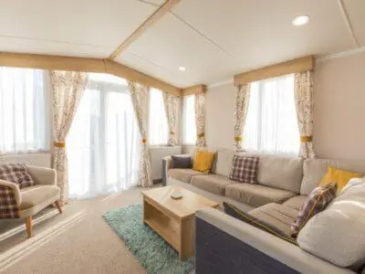 a living room with a couch and a table at Mowbreck Park in Kirkham