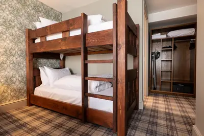 a bunk bed room with two bunk beds at Offshore - The Inn Collection Group in Lytham St Annes