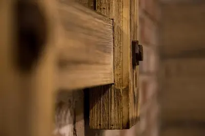 a close up of a wooden door on a wall at Winckley Stays in Preston