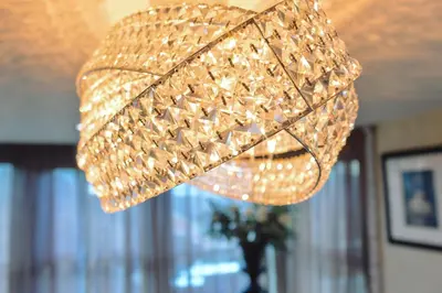 a chandelier hanging from a ceiling in a room at Posh Pads - Liverpool 1 - Apart-Hotel in Liverpool