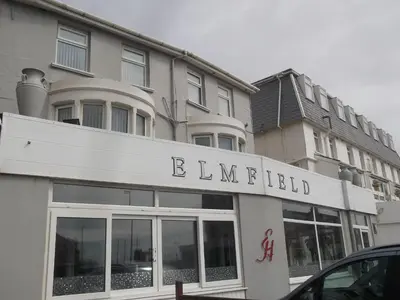 a building with a sign on the front of a building at Elmfield in Blackpool